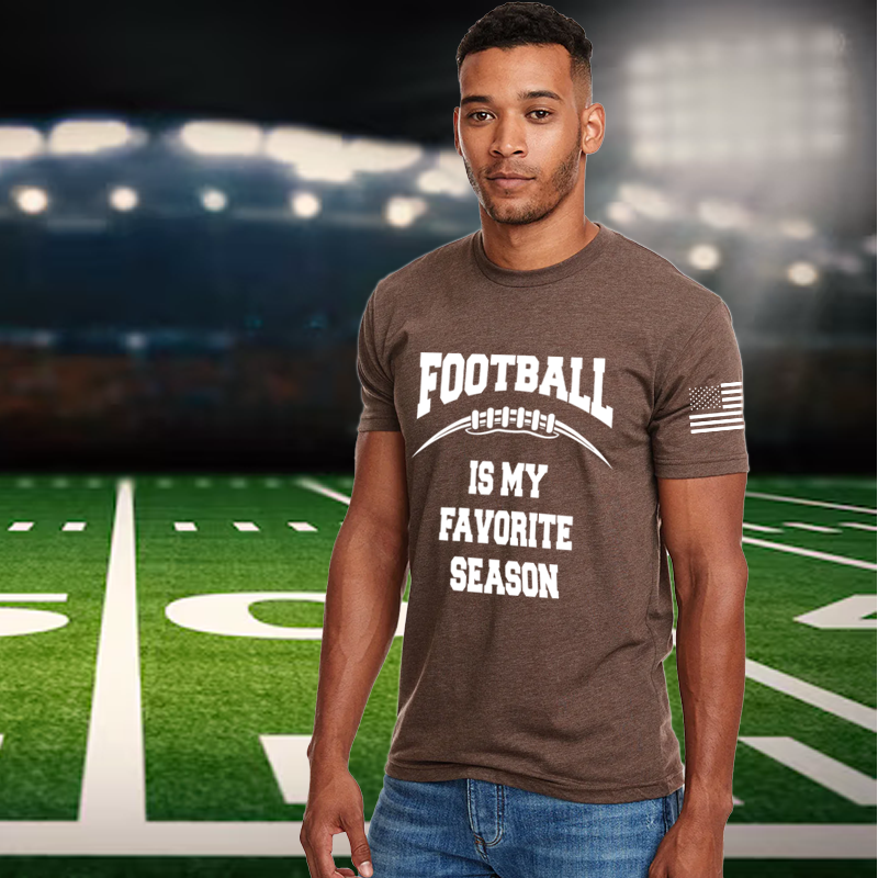 Man wearing a t-shirt with 'Football is my favorite season' on a football field background