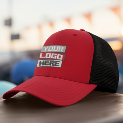 Red and black cap with customizable logo area on a blurred background